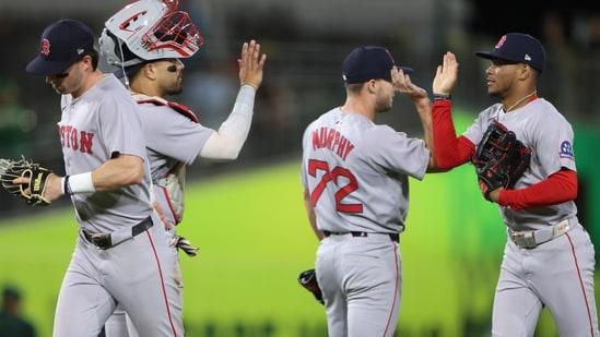 BREAKING: The umpires who officiated the game between the Boston Red Sox and Oakland Athletics have been suspended pending an investigation after the board of directors discovered they missed multiple Red Sox violations that significantly affected the outcome of the game. - Luxury Blogs